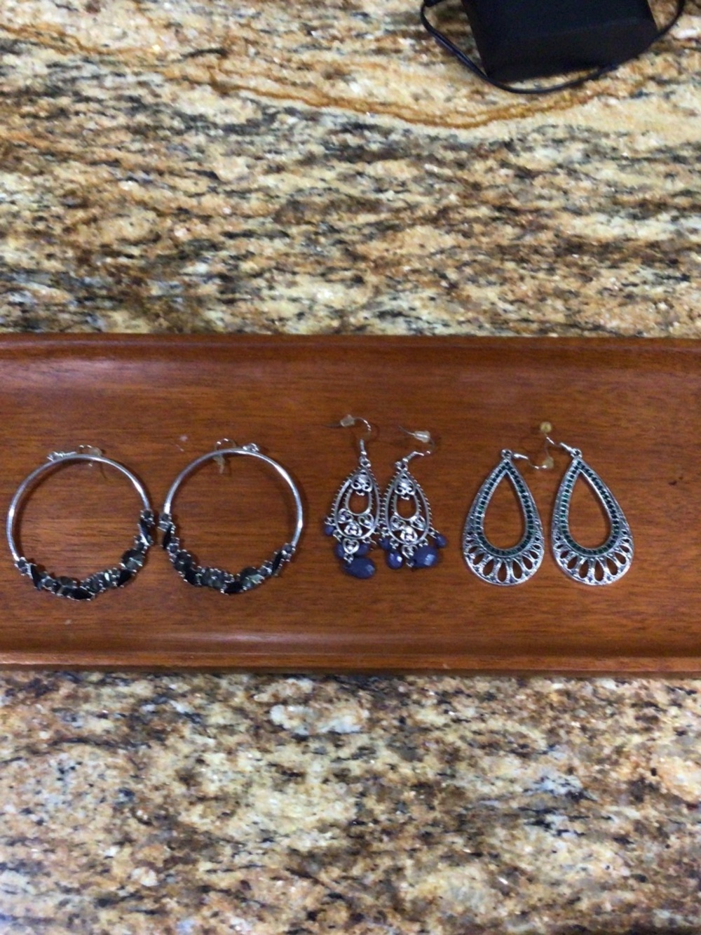 Three pair of silver tone  earrings with rhinestones and beads. New without tags